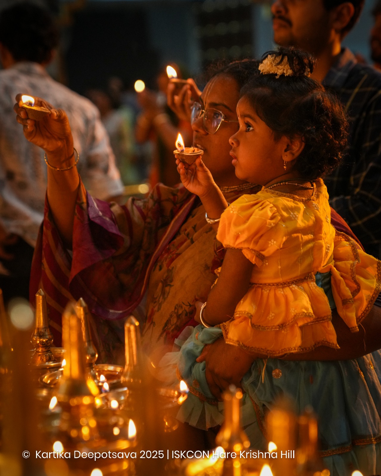 Devotees Offering Lamps at Kartika Deepotsava 2025